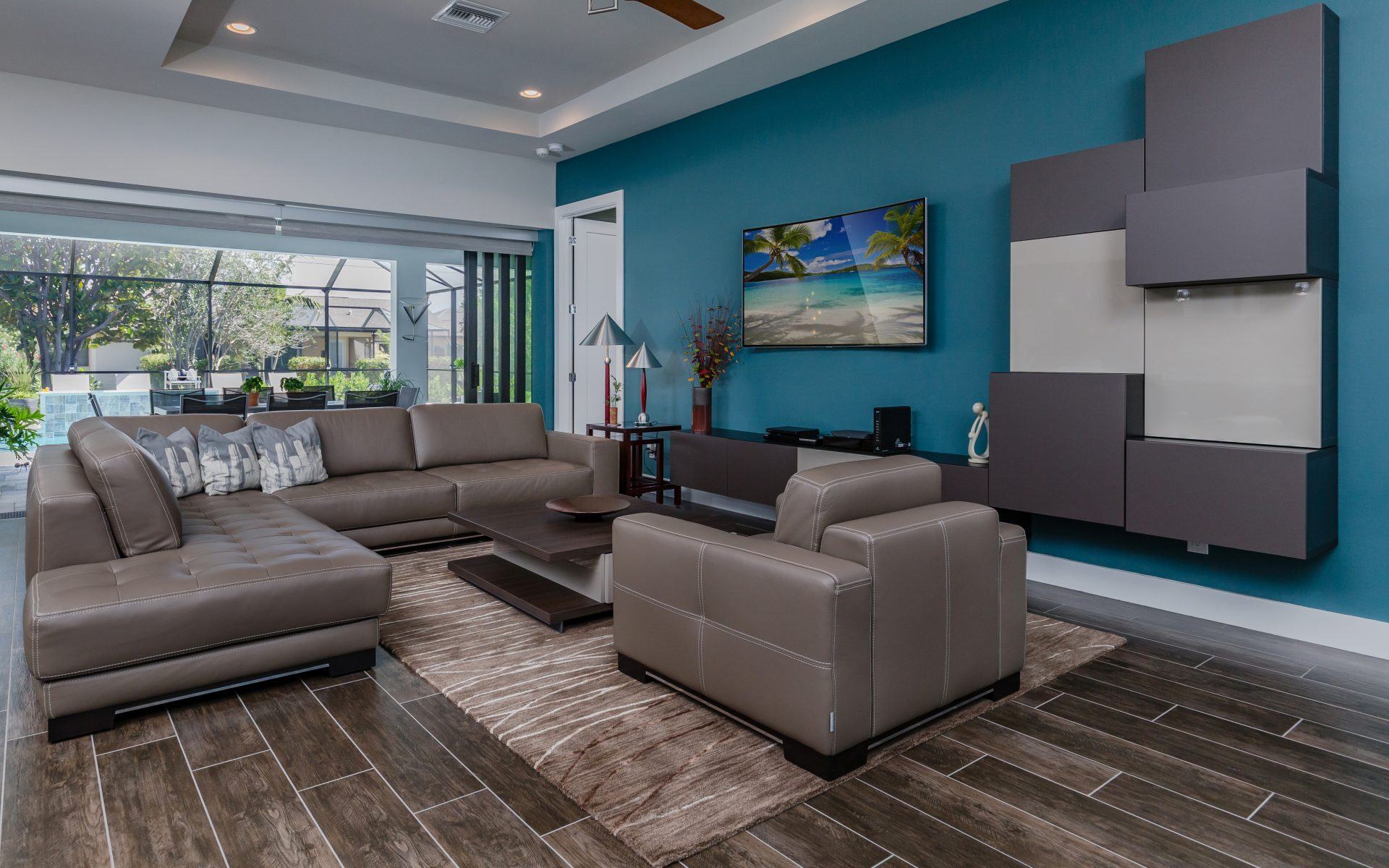 Contemporary living room with dark wood look tile floor