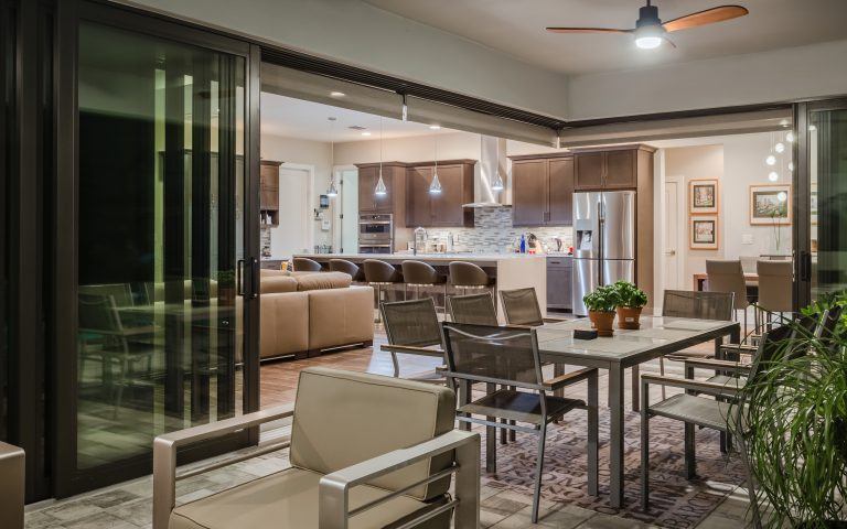 Contemporary lanai with 90 degree pocketing sliding glass door