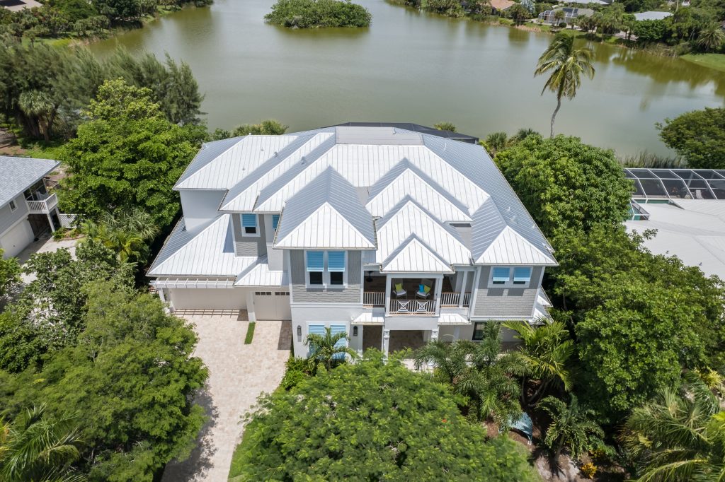 Exterior of a Sanibel Custom Home built on Lake Murex by Aubuchon Homes.